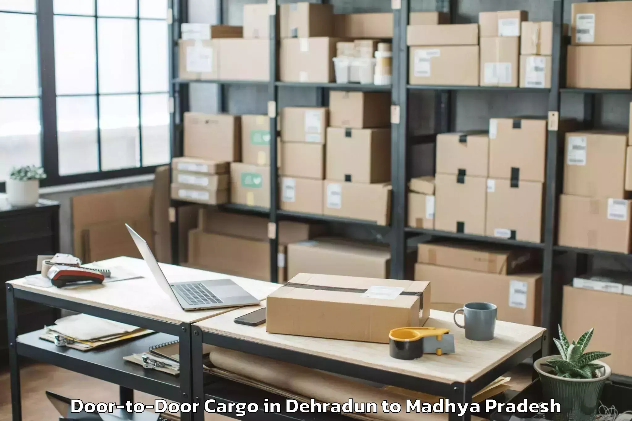 Book Dehradun to Malhargarh Door To Door Cargo Online